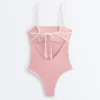Bañador bandeau con ribete en contraste Bañador bandeau con ribete en contraste