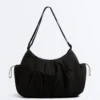 Bolso shopper con bolsillos laterales