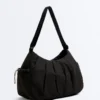 Bolso shopper con bolsillos laterales