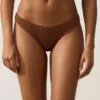 Braguitas de bikini de cobertura media con corte en U y tejido arrugado Braguitas de bikini de cobertura media con corte en U y tejido arrugado