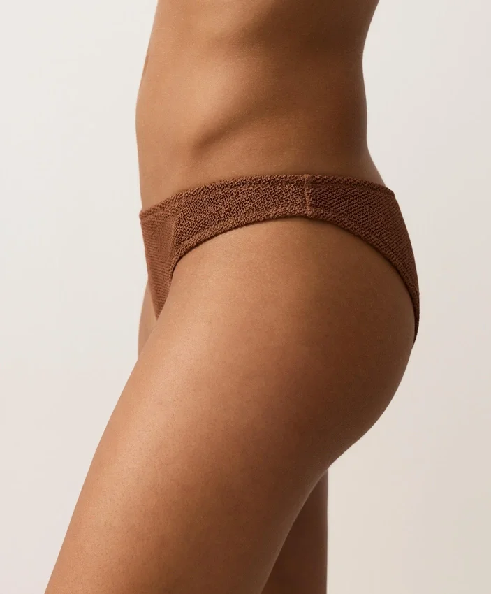 Braguitas de bikini de cobertura media con corte en U y tejido arrugado Braguitas de bikini de cobertura media con corte en U y tejido arrugado
