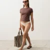 Braguitas de bikini de cobertura media con corte en U y tejido arrugado Braguitas de bikini de cobertura media con corte en U y tejido arrugado