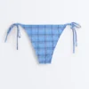 Braguitas de bikini de cobertura media con estampado de cuadros y lazos Braguitas de bikini de cobertura media con estampado de cuadros y lazos