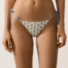 Braguitas de bikini de cobertura media con lazo de croché y estampado de ondas Braguitas de bikini de cobertura media con lazo de croché y estampado de ondas