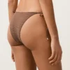 Braguitas de bikini de cobertura media con lazo y estampado de lunares pequeños