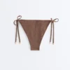 Braguitas de bikini de cobertura media con lazo y estampado de lunares pequeños