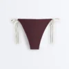 Braguitas de bikini de cobertura media con lazos