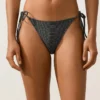 Braguitas de bikini de cobertura media con lazos en jacquard con efecto lavado Braguitas de bikini de cobertura media con lazos en jacquard con efecto lavado