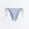 Braguitas de bikini de cobertura media con rayas texturizadas y lazos Braguitas de bikini de cobertura media con rayas texturizadas y lazos