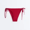 Braguitas de bikini de cobertura media con tejido tipo gofre y lazos Braguitas de bikini de cobertura media con tejido tipo gofre y lazos