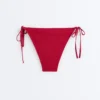 Braguitas de bikini de cobertura media con tejido tipo gofre y lazos Braguitas de bikini de cobertura media con tejido tipo gofre y lazos