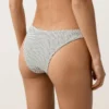 Braguitas de bikini de corte en U y cobertura media con estampado de lunares en jacquard Braguitas de bikini de corte en U y cobertura media con estampado de lunares en jacquard