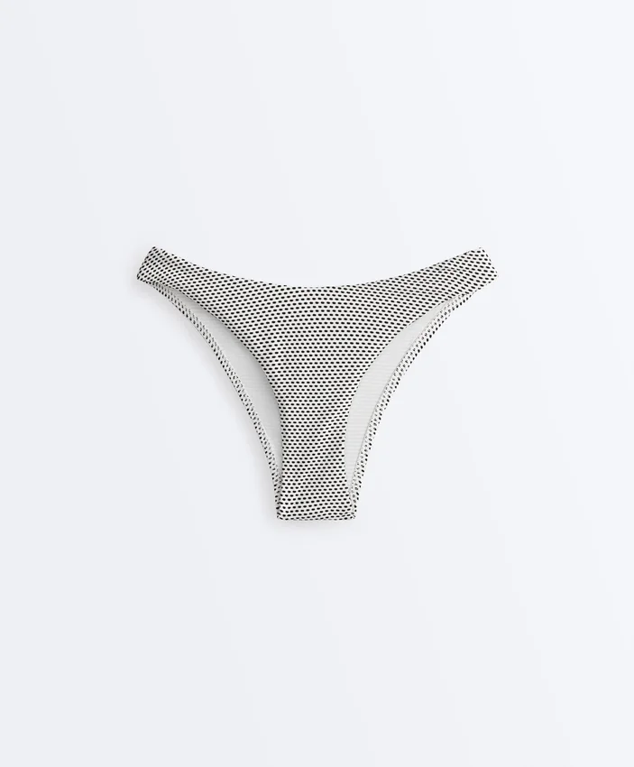 Braguitas de bikini de corte en U y cobertura media con estampado de lunares en jacquard Braguitas de bikini de corte en U y cobertura media con estampado de lunares en jacquard