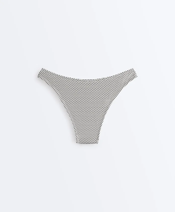 Braguitas de bikini de corte en U y cobertura media con estampado de lunares en jacquard Braguitas de bikini de corte en U y cobertura media con estampado de lunares en jacquard