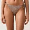 Braguitas de bikinis de cobertura media con estampado mini de hilo metálico y lazos Braguitas de bikinis de cobertura media con estampado mini de hilo metálico y lazos