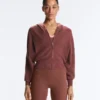 Chaqueta con capucha de punto elástico Chaqueta con capucha de punto elástico