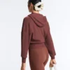 Chaqueta con capucha de punto elástico Chaqueta con capucha de punto elástico