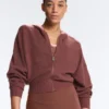 Chaqueta con capucha de punto elástico Chaqueta con capucha de punto elástico