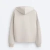 Chaqueta con capucha y detalles acanalados en modal cepillado