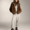 Chaqueta con capucha y mangas anchas de algodón Chaqueta con capucha y mangas anchas de algodón