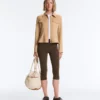 Chaqueta con volantes efecto neopreno y ribetes Chaqueta con volantes efecto neopreno y ribetes