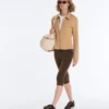 Chaqueta con volantes efecto neopreno y ribetes Chaqueta con volantes efecto neopreno y ribetes