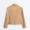Chaqueta con volantes efecto neopreno y ribetes Chaqueta con volantes efecto neopreno y ribetes
