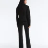 Pantalones acampanados de talle alto con efecto neopreno Pantalones acampanados de talle alto con efecto neopreno