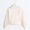 Chaqueta de algodón piqué con cinta lateral en espiga Chaqueta de algodón piqué con cinta lateral en espiga