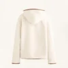 Chaqueta de imitación de piel de oveja con capucha