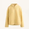 Chaqueta de imitación de piel de oveja con capucha Chaqueta de imitación de piel de oveja con capucha