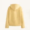 Chaqueta de imitación de piel de oveja con capucha Chaqueta de imitación de piel de oveja con capucha