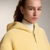 Chaqueta de imitación de piel de oveja con capucha Chaqueta de imitación de piel de oveja con capucha