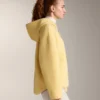 Chaqueta de imitación de piel de oveja con capucha Chaqueta de imitación de piel de oveja con capucha