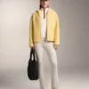 Chaqueta de imitación de piel de oveja con capucha Chaqueta de imitación de piel de oveja con capucha