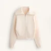 Chaqueta de punto con cuello alto