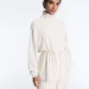 Chaqueta larga a rayas con cintura ajustable y modal Soft Touch Chaqueta larga a rayas con cintura ajustable y modal Soft Touch