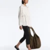 Chaqueta larga a rayas con cintura ajustable y modal Soft Touch Chaqueta larga a rayas con cintura ajustable y modal Soft Touch