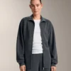 Chaqueta larga asimétrica a rayas con modal Chaqueta larga asimétrica a rayas con modal