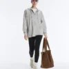 Chaqueta larga con capucha de piqué jaspeado Chaqueta larga con capucha de piqué jaspeado