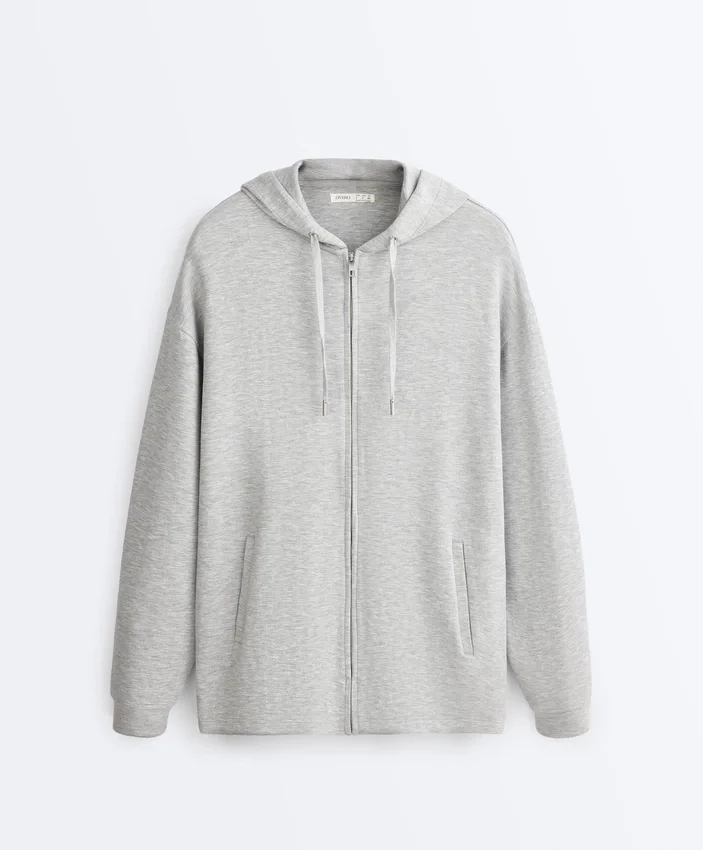 Chaqueta larga con capucha de piqué jaspeado Chaqueta larga con capucha de piqué jaspeado