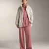 Chaqueta larga con cintura ajustable y textura a rayas Chaqueta larga con cintura ajustable y textura a rayas