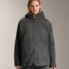 Chaqueta oversize de imitación de piel de oveja con capucha forrada de piel sintética Chaqueta oversize de imitación de piel de oveja con capucha forrada de piel sintética