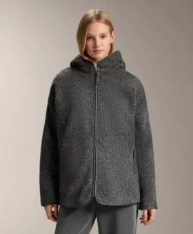 Chaqueta oversize de imitación de piel de oveja con capucha forrada de piel sintética