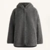 Chaqueta oversize de imitación de piel de oveja con capucha forrada de piel sintética Chaqueta oversize de imitación de piel de oveja con capucha forrada de piel sintética