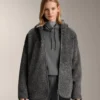 Chaqueta oversize de imitación de piel de oveja con capucha forrada de piel sintética Chaqueta oversize de imitación de piel de oveja con capucha forrada de piel sintética