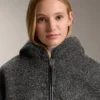 Chaqueta oversize de imitación de piel de oveja con capucha forrada de piel sintética Chaqueta oversize de imitación de piel de oveja con capucha forrada de piel sintética