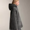Chaqueta oversize de imitación de piel de oveja con capucha forrada de piel sintética Chaqueta oversize de imitación de piel de oveja con capucha forrada de piel sintética