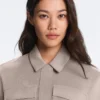 Chaqueta recta con cinturón y modal Soft Touch