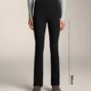 Pantalones acampanados de talle alto con bolsillos Pantalones acampanados de talle alto con bolsillos